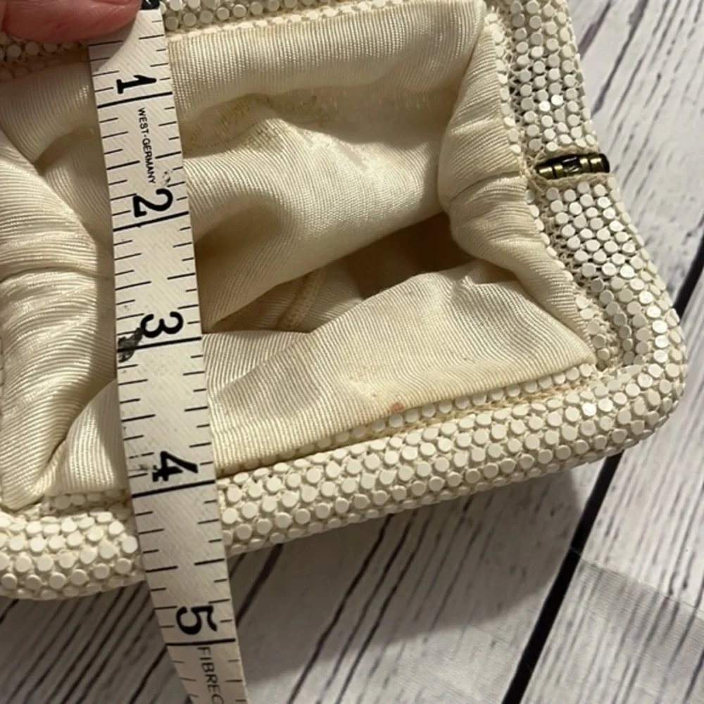 Dainty special occasion clutch with snap hinge closure cream